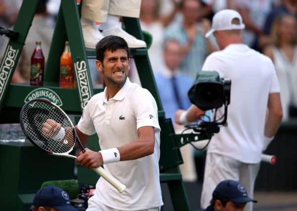 Novak Djokovic celebrates his win against Kyle Edmund. Picture: Steven Paston/PA