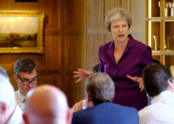 Theresa May addresses her Cabinet at chequers over Brexit.