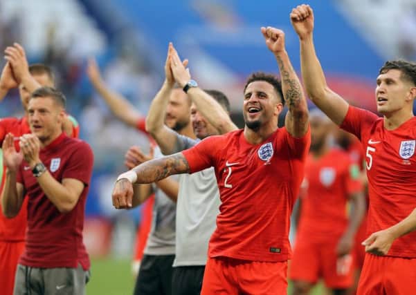 England players celebrate their World Cup quater-final win over Sweden with fans.
