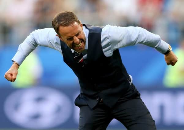 England manager Gareth Southgate celebrates after the FIFA World Cup quarter-final win over Sweden (Pictures: PA)