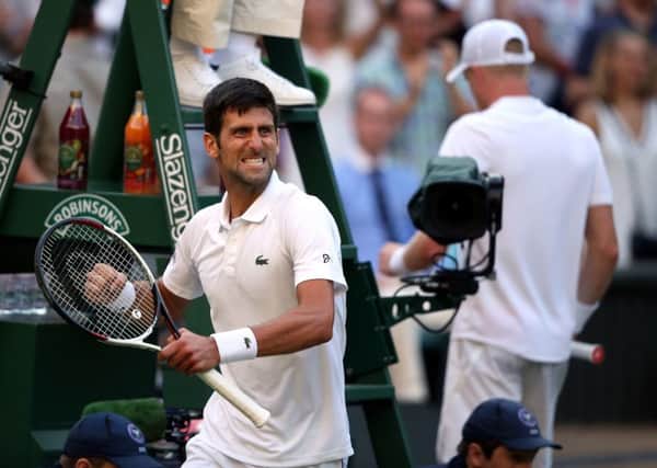 Novak Djokovic celebrates his win against Kyle Edmund (Pictures: Steve Paston/PA)