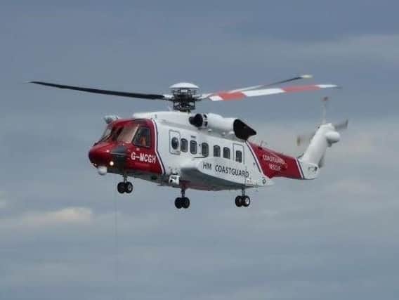 AN HM Coastguard helicopter is involved in the search