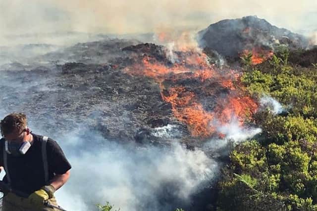 Handout photo taken from the Twitter feed of @Har_DistrictWM of a fire on Catstones Moor, as West Yorkshire Fire and Rescue Service said 12 fire engines were called to the scene of the fire on land near Cullingworth, to the north west of Bradford. PRESS ASSOCIATION Photo.