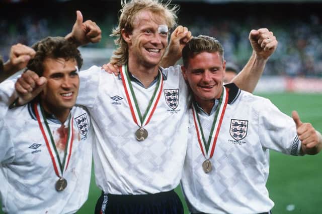 Tony Dorigo, Mark Wright and Paul Gascoigne celebrate with their fourth place medals. (Picture: Mark Leech/Getty Images)