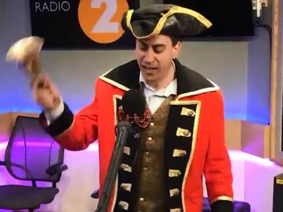 Ed Miliband has a go at being a town crier. (Photo: BBC Radio 2).