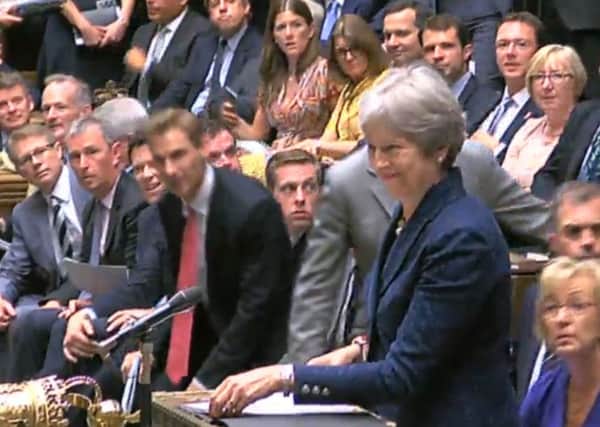 Theresa May addresses Parliament after the resignations of Boris Johnson and David Davis.