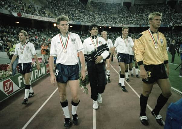 England and Italy players do a lap of honour after the FIFA World Cup 3rd Place play-off at Stadio San Nicola on July 07, 1990 in Bari. In front are Chris Waddle (left) and Chris Woods (right). (Picture: Professional Sport/Popperfoto/Getty Images)