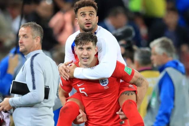 England's John Stones and Kyle Walker celebrate their side winning the FIFA World Cup 2018, round of 16 match at the Spartak Stadium, Moscow, against Colombia. (Picture: Adam Davy/PA Wire)