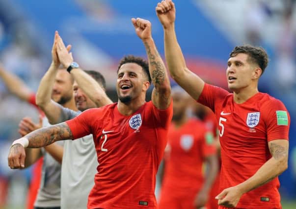 England's Kyle Walker (centre) and John Stones (right) celebrate victory after the FIFA World Cup, Quarter Final match at the Samara Stadium. (Picture: Owen Humphreys/PA Wire)