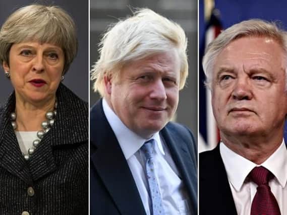 Boris Johnson (centre) followed David Davis in resigning from Theresa May's cabinet due to the Government's stance on a Brexit deal.