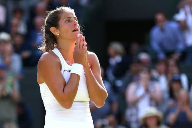 Julia Goerges looks surprised after her win against Kiki Bertens that took her into the women's singles semi-finals (Picture: Nigel French/PA Wire).