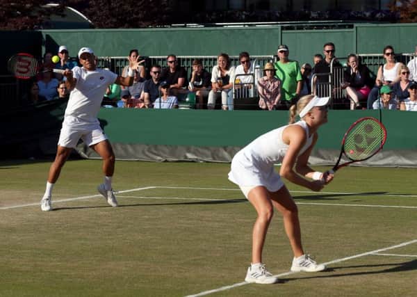 Jay Clarke and Harriet Dart in action in the doubles.