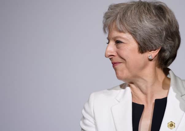Can Theresa May survive the Brexit negotiations of Boris Johnson and David Davis?
