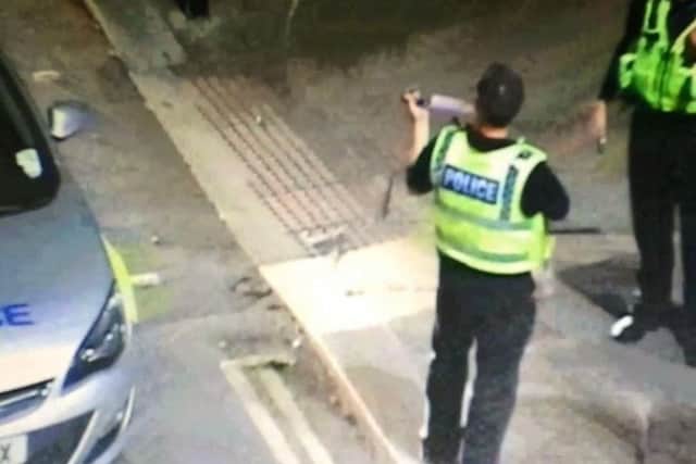 CCTV footage shows PC Richard Farrar picking up the knife which was being carried by the man he apprehended.