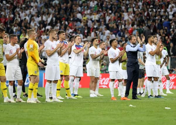 HEROES: England manager Gareth Southgate and his players applaud fans after losing the World Cup Semi-Final against Croatia in Moscow. Picture: Owen Humphreys/PA