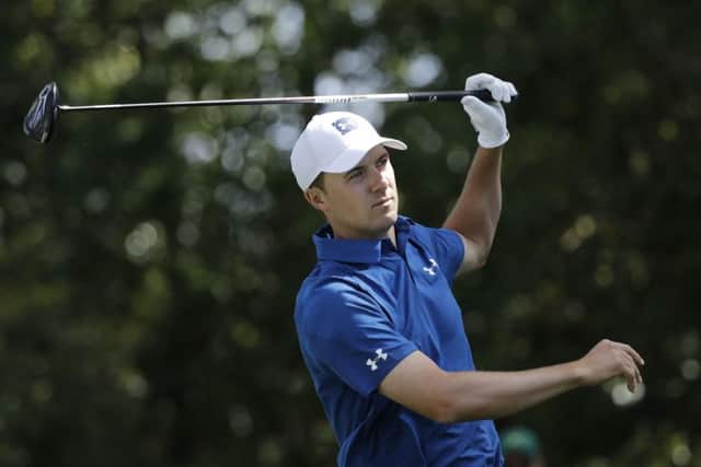 Jordan Spieth watches his drive on the second hole during the second round at the Masters in April this year. Picture: AP/David J. Phillip.