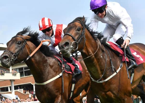 Sands Of Mali and Paul Hanagan, right, win the Sandy Lane Stakes at Haydock.