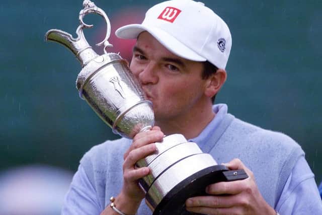Scotland's Paul Lawrie kisses the trophy after winning the 1999 Open Golf Championship at Carnoustie