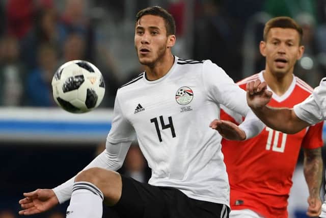 New Huddersfield Town signing Ramadan Sobhi (L) playing for Egypt against hosts Russia (Picture: PAUL ELLIS/AFP/Getty Images)