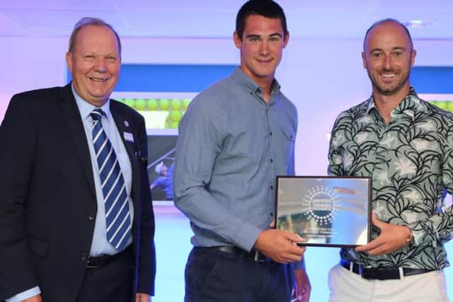 Adam Cox receives the award from the LTA on behalf of Skipton Tennis Club.