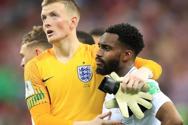 England goalkeeper Jordan Pickford (left) and Danny Rose look dejected after defeat to Croatia (Picture: PA)