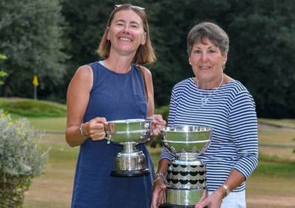 Enid Spencer, right, of Leeds GC, winner of the Yorkshire Challenge Bowl on her home course, with club-mate Liz Burkill, who she beat in the final.