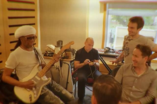 Chic legend Nile Rodgers gets to work on his guitar part for the charity hit