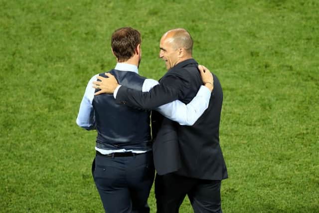 We'LL MEET AGAIN: England manager Gareth Southgate (left) and Belgium manager Roberto Martinez shake hands after their Group G match at Kaliningrad Stadium. Picture: Tim Goode/PA