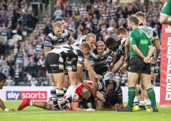 Hull FC's Albert Kelly scores a try against St Helens.