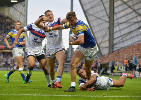 Ash Handley scores the Rhinos' third try. Picture Bruce Rollinson