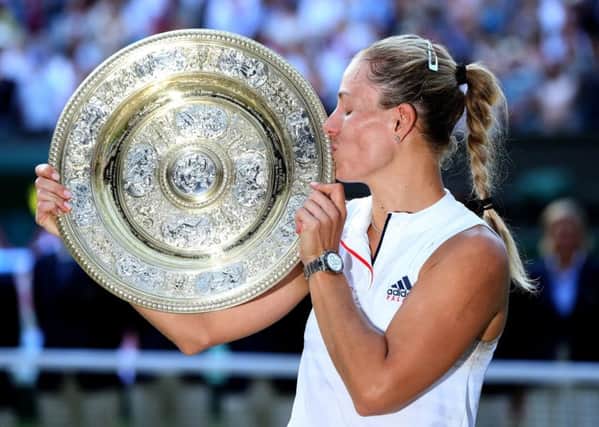 Angelique Kerber kisses the trophy after winning Wimbledon (Pictures: PA)
