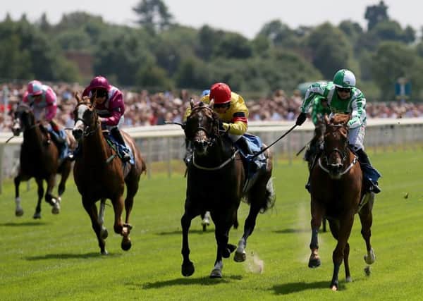 Mr Lupton (right) ridden by Jack Garritty wins the John Smith's City Walls Stakes  at York. Picture: Richard Sellers/PA