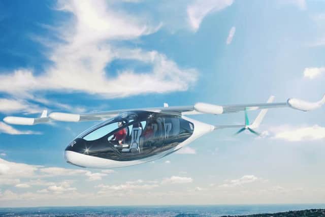 Photo issued by Rolls-Royce PLC of a flying taxi concept which has been unveiled by engine maker. The hybrid vehicle could transport five passengers at speeds of 250mph for up to 500 miles without being recharged. PA