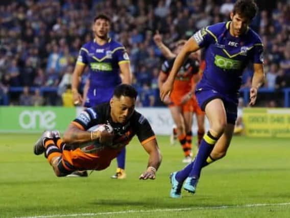 Quentin Laulu-Togaga'e goes over for a try on his Castleford Tigers debut versus Warrington.