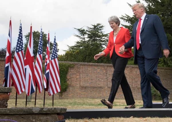 Has Donald Trump strengthened Theresa May's resolve over Brexit?