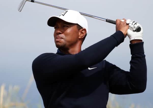Tiger Woods features in The Open today - but the prestigious golf tournament will not be shown live on terrestrial TV to the dismay of John Grogan MP.