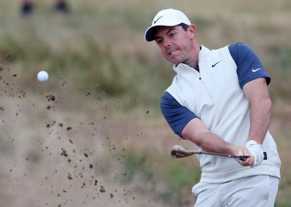 Rory McIlroy splashes out of a bunker during a practice round at Carnoustie. (Picture: PA)