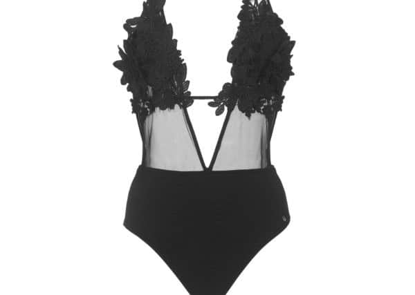 Black flower swimsuit, Â£69, at KurtGeiger.com.