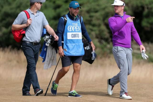 Harrogate's Thomas Curtis, right, with his caddie, centre, walks the fairway at Carnoustie. (Picture: PA)