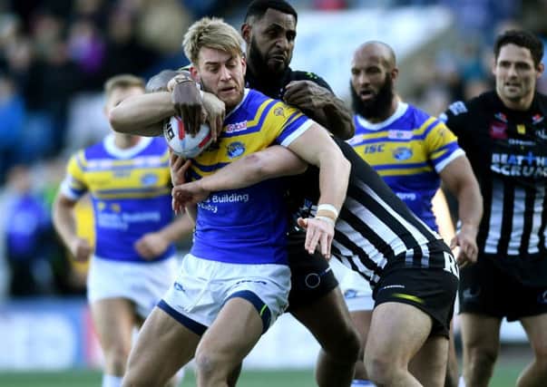 Betfred Super League.
Widnes Vikings v Leeds Rhinos.
Leeds Rhinos Jack Ormondroyd  is tackled by Widnes Vikings defence.
25th February 2018.
Picture Jonathan Gawthorpe