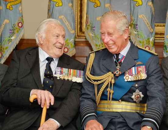Geoffrey Wellum enjoying a joke with the Prince of Wales during a reception at Church House following a service at Westminster Abbey, London to mark the 75th anniversary of the Battle of Britain.