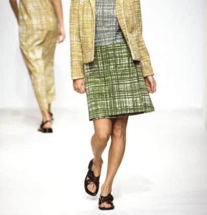 K
ate Moss models for Prada spring/summer 1996 ready-to-wear in Milan. 
Copyright Catwalking.com.