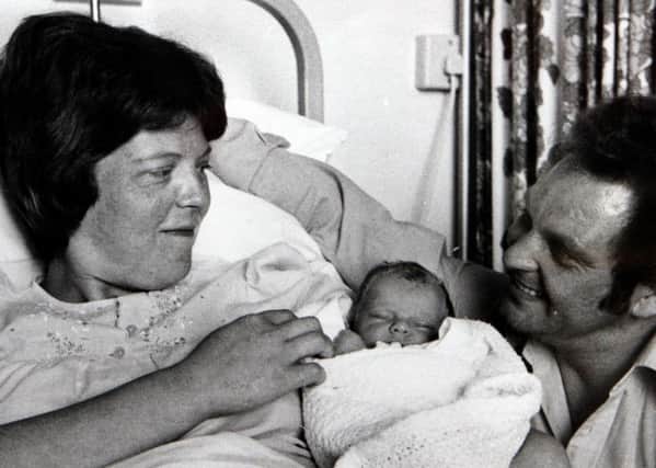 Lesley and John Brown with their daughter Louise, the world's first 'test tube baby'.