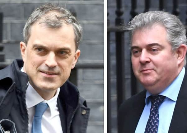 Chief whip Julian Smith, left, and party chairman Brandon Lewis, right, are at the centre of the latest Brexit storm.