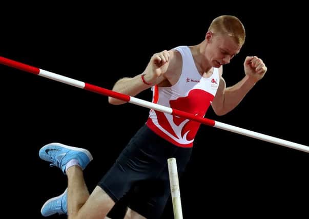 High flier: South Yorkshire pole vaulter Adam Hague competing at the Commonwealth Games where he finished fourth. (Picture: PA)