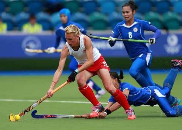 England's Alex Danson gets away from Malaysia's Siti Noor Amarina Ruhani during the 2014 Commonwealth Games in Glasgow. (Picture: David Davies/PA Wire)