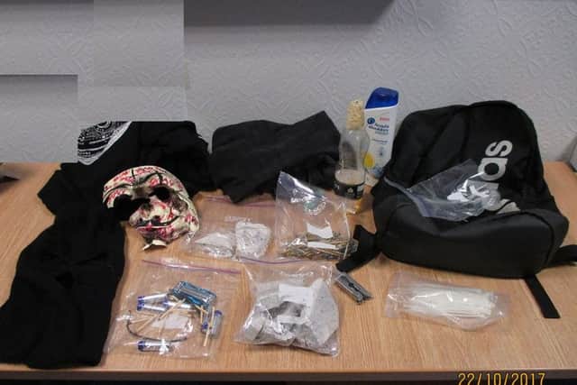 Photo issued by North East CTU of the contents of a rucksack that was found by officers searching the older boy's hideout, which prosecutors claimed were instruments for building an explosive. PA