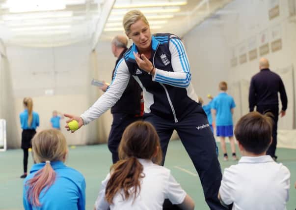SOUND ADVICE: Katherine Brunt chats to children during a cricket workshop at Headingley in 2015. Picture: Simon Hulme