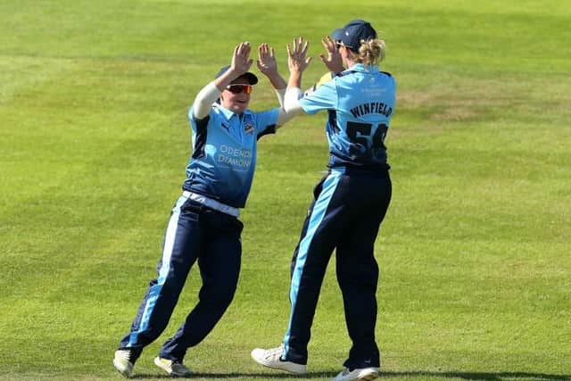 Yorkshire Diamonds Gwen Davies (left) and Lauren Winfield celebrate taking the wicket of Western Storm Smriti Mandhana. Picture: Mark Kerton/PA
