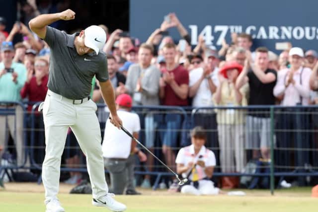 Francesco Molinari is ecstatic after holing a birdie putt at the last hole at Carnoustie that would ultimately lead to him winning the Open by two shots to become Italys first winner of a major golf championship (Picture: Jane Barlow/PA Wire).